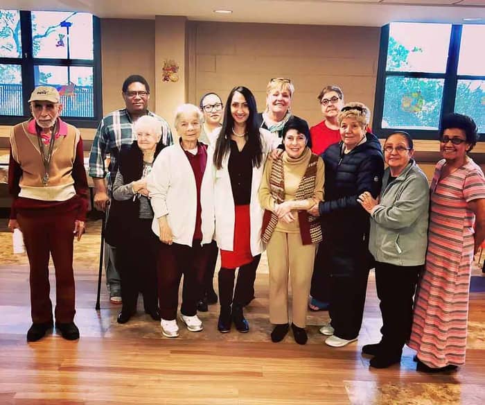 Dr Q with community members — health education in action